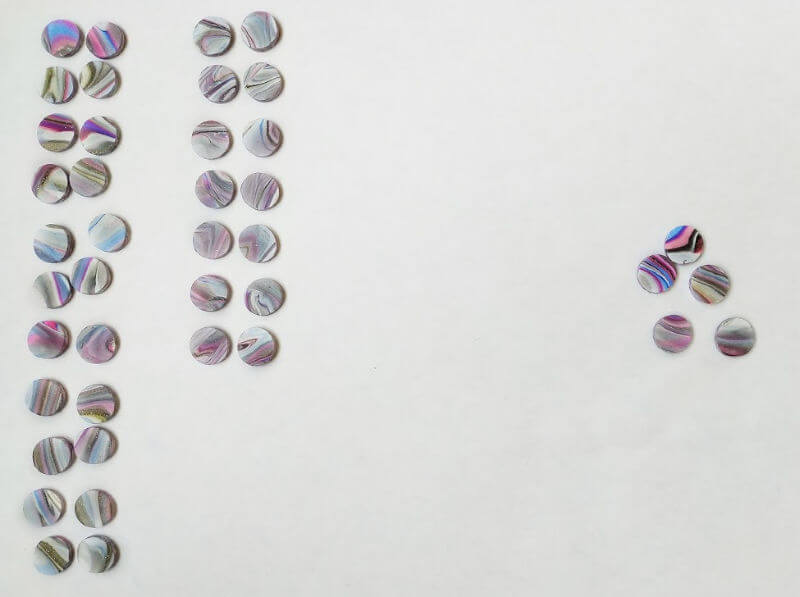 image of marbled polymer clay stud earrings in pairs